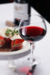 Close-up of wine in glass on table