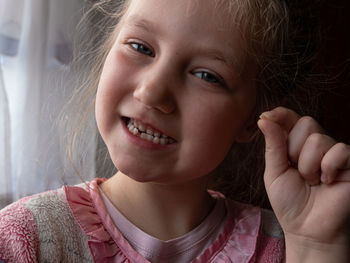 Close-up portrait of cute girl