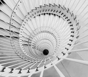 Directly below shot of spiral staircase in building