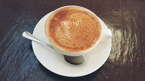 Coffee cup on table