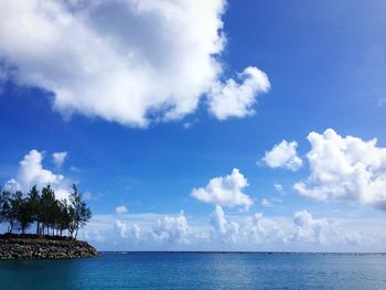 Scenic view of sea against cloudy sky