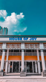 Low angle view of building against blue sky