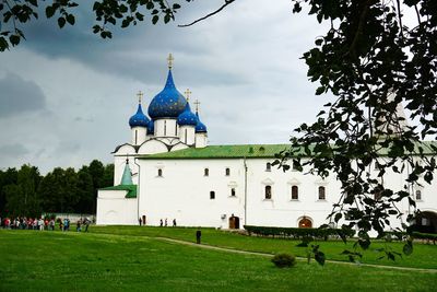 View of temple building against cloudy sky