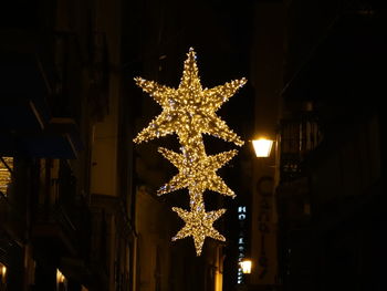 Close-up of illuminated christmas tree at night