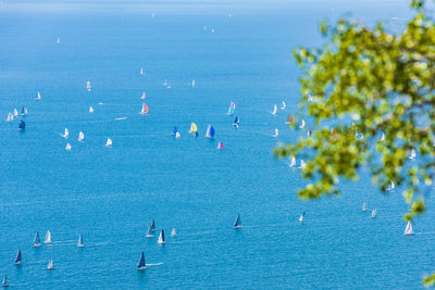 Group of people on sailboat in sea