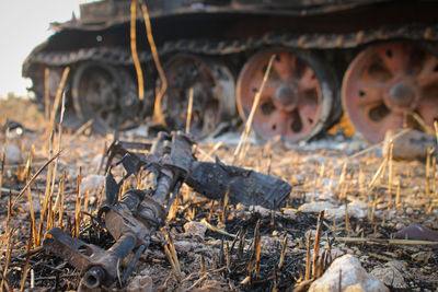 Close-up of machine part on field