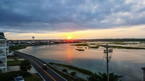 High angle view of bridge over river against cloudy sky
