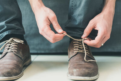 Low section of man sitting