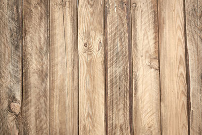 Background of gray wooden boards with cracks, scuffs. backdrop for compositions, rustic