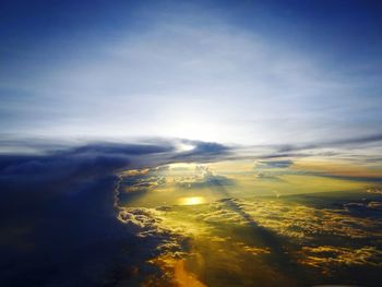 Aerial view of landscape against blue sky