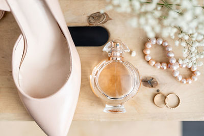 Close-up of wedding rings on table