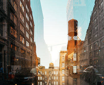 Double exposure of buildings and cars