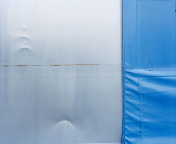 Close-up of blue water against sky