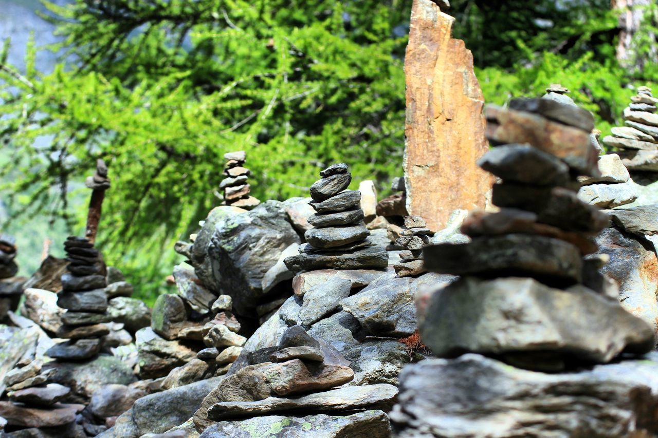 CLOSE-UP OF STONE STACK ON ROCKS