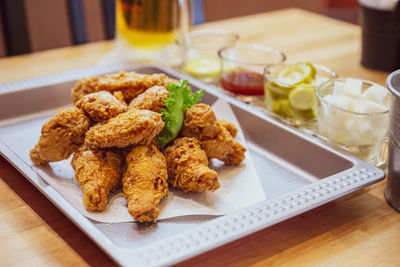 High angle view of serving food in plate on table