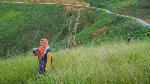 High angle view of two people in grass