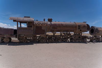 Built structure on land against sky
