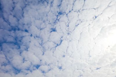 Low angle view of snow against sky