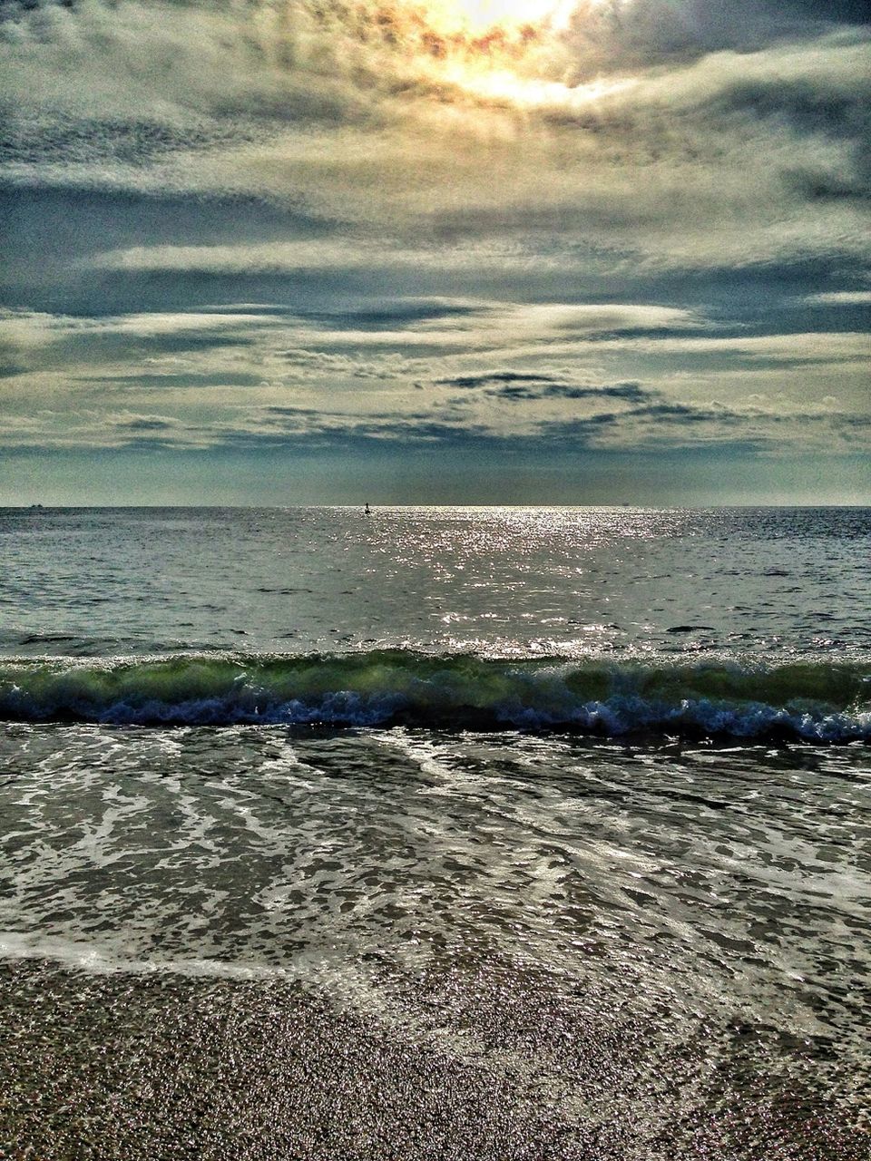 sea, horizon over water, beach, water, sky, shore, cloud - sky, scenics, tranquil scene, beauty in nature, tranquility, sand, cloudy, nature, wave, cloud, idyllic, coastline, surf, outdoors