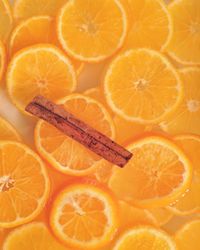 Close-up of orange slices with cinnamon