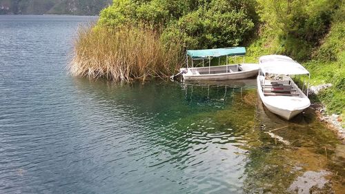 High angle view of boat moored in river