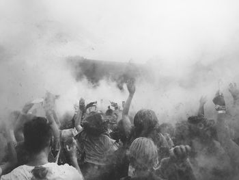 High angle view of people enjoying during holi