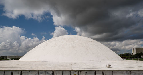 View of building against cloudy sky