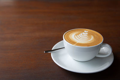 Coffee cup on table