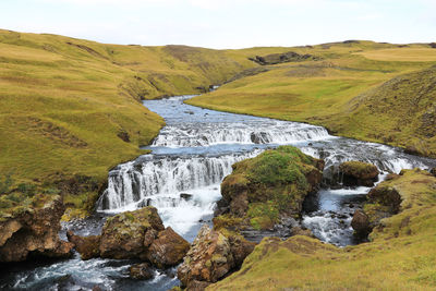 Scenic view of stream against sky