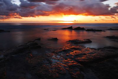 Scenic view of sea against sky during sunset