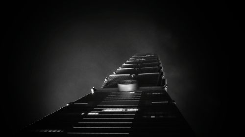 Low angle view of illuminated building at night
