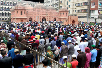 Group of people in front of historical building