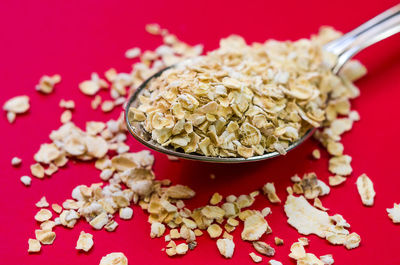 Close-up of a spoonful of rolled oats 