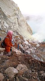 Woman hiker in ijen crater banyuwangi indonesia