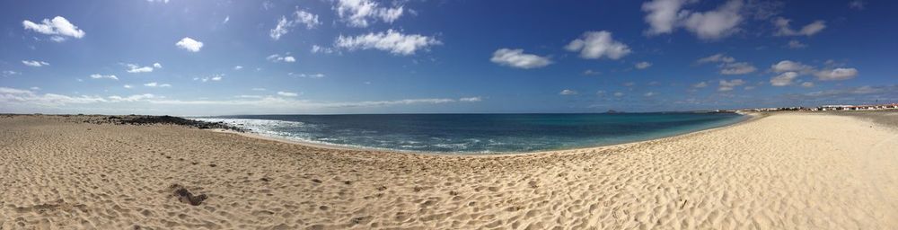 Panoramic view of beach against sky