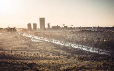 Aerial view of cityscape against clear sky