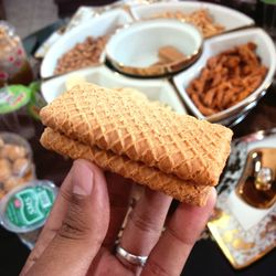 Close-up of hand holding ice cream