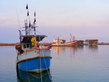 Fishing boats dock in the sea at cha am, thailand.