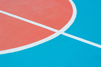 High angle view of basketball hoop against blue background