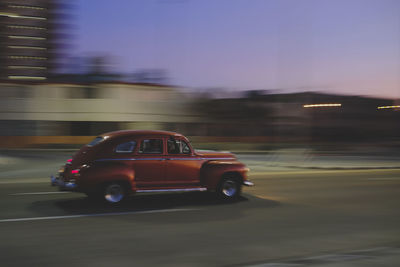 Car on road at night