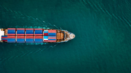 High angle view of ship sailing in sea