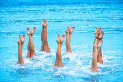 Synchronized or artistic swimming in swimming pool