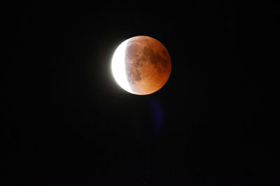 Scenic view of moon against sky at night