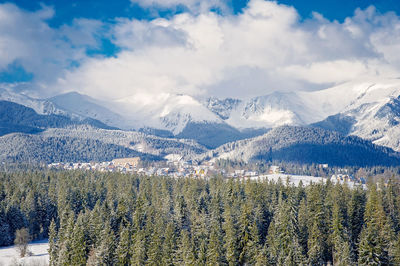 Scenic view of snowcapped mountains against sky