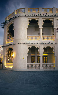 Facade of historic building against sky