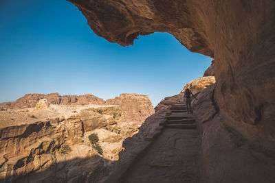 Low angle view of rock formations against sky