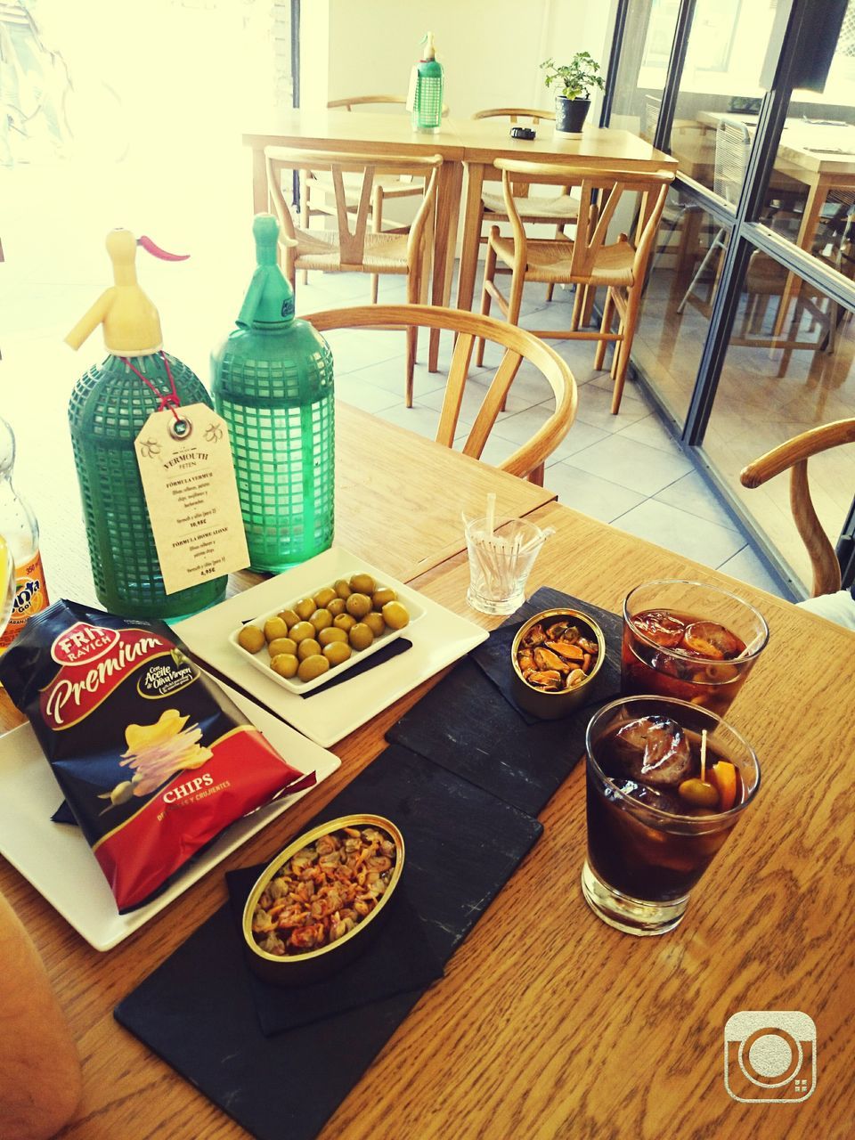 table, indoors, still life, wood - material, chair, variation, food and drink, high angle view, arrangement, no people, plate, absence, large group of objects, home interior, book, dining table, restaurant, drink, day, empty