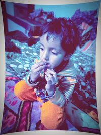 Portrait of cute baby girl on bed