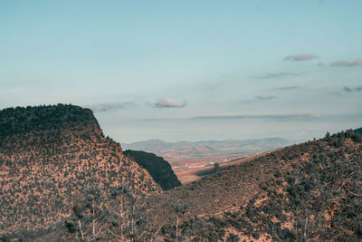 Scenic view of rocky mountains against sky