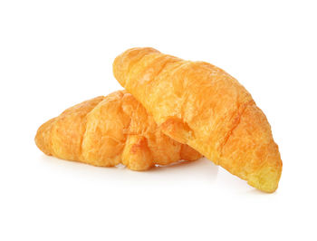 Close-up of bread on white background